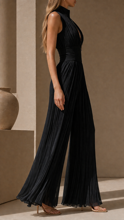 Greta – Mono plisado con cremallera frontal y pantalón palazzo